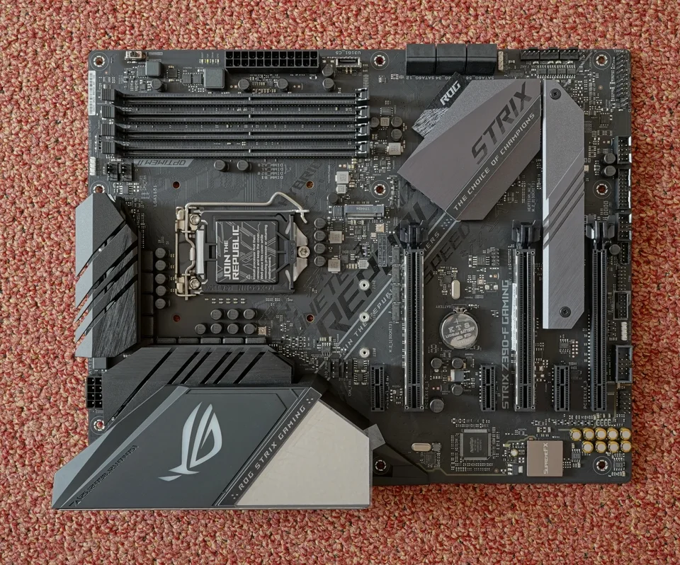 ASUS ROG Strix Z390-F Gaming motherboard with four empty DDR4 memory slots beside the CPU socket
