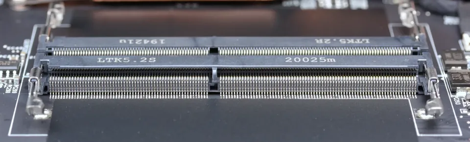 Empty DDR4 SO-DIMM memory sockets with offset alignment keys and metal retaining clips.