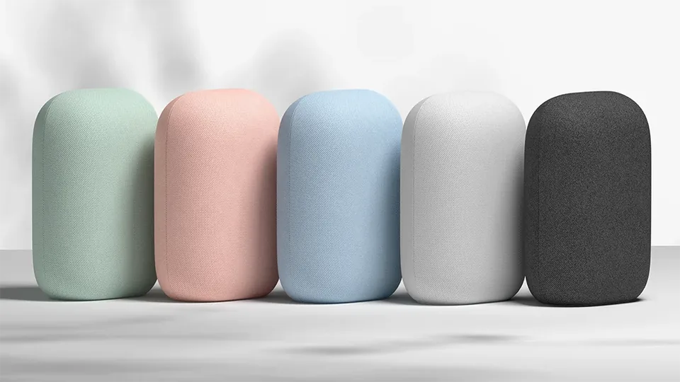 Five Google Nest Audio speakers in different colors