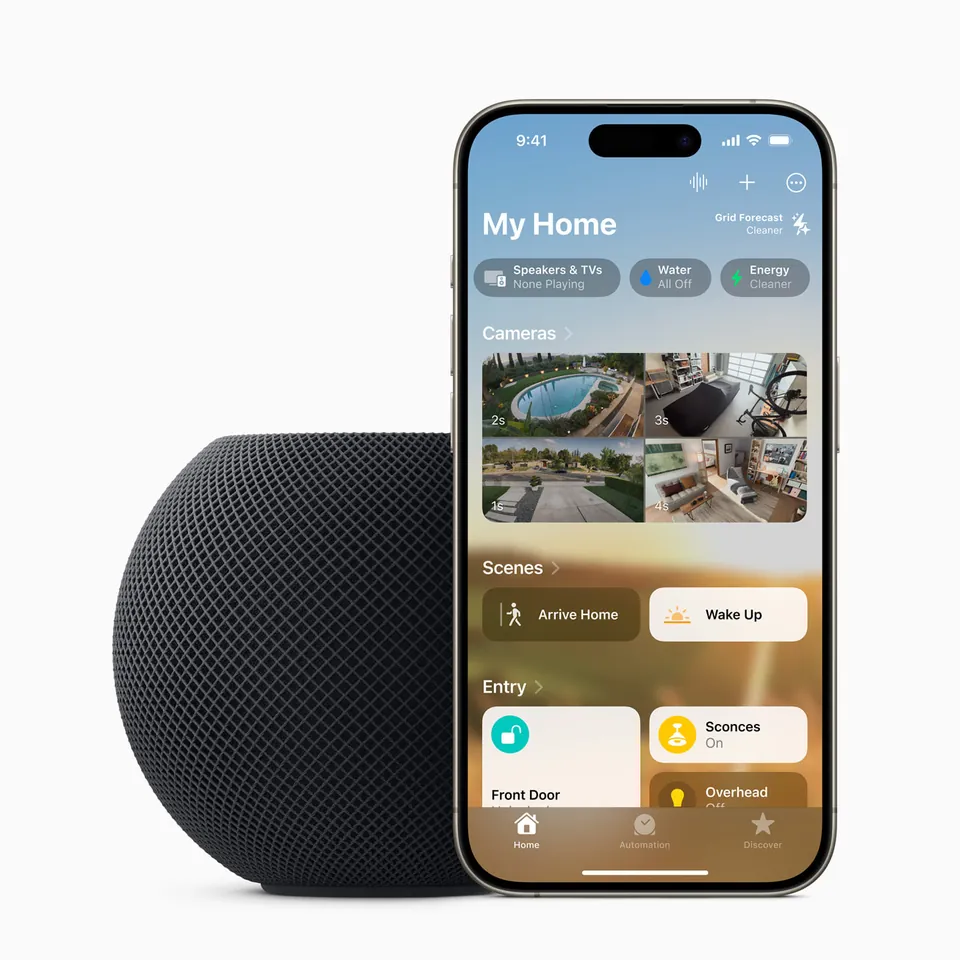 HomePod mini beside the Apple Home app on iPhone