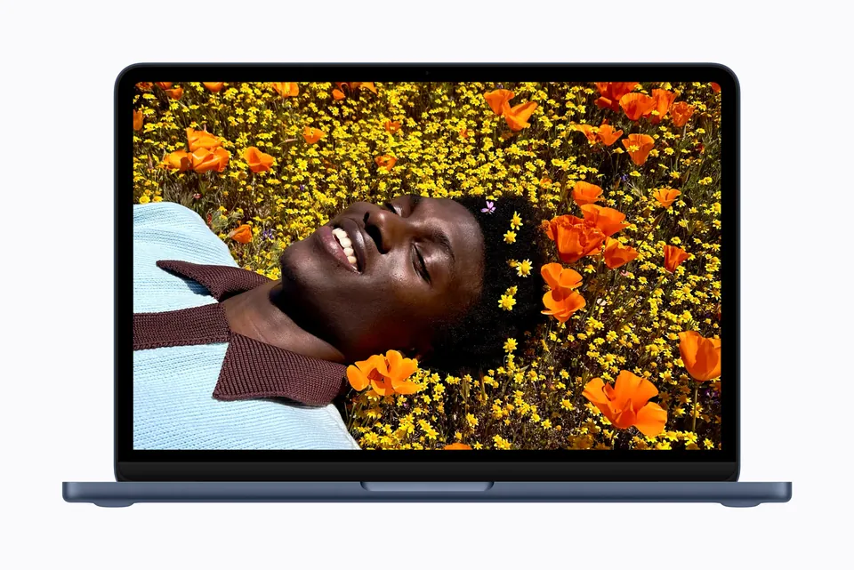 Apple MacBook Neo in indigo with the display open